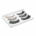 Multiple styles of false eyelashes including natural, wispy and dramatic on white background
