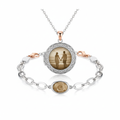 Heat activated photo jewelry locket necklace and bracelet revealing hidden photo on white background