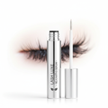 Elegant lash serum applicator tube on white background with beautiful long lashes